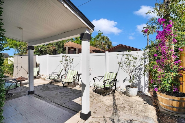 705 28th St N, Saint Petersburg, FL 33713 - view of patio / terrace with a fenced backyard