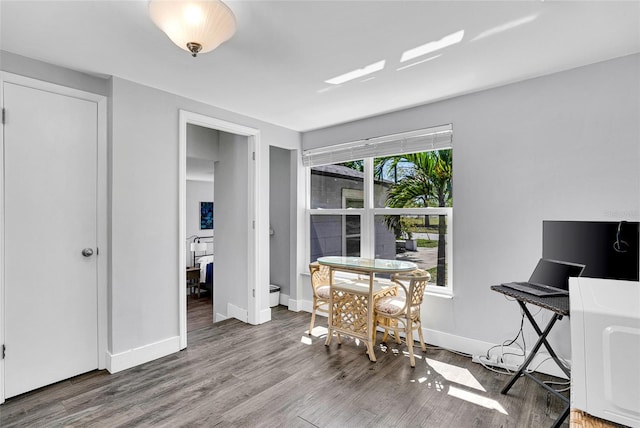 705 28th St N, Saint Petersburg, FL 33713 - dining space featuring baseboards and wood finished floors