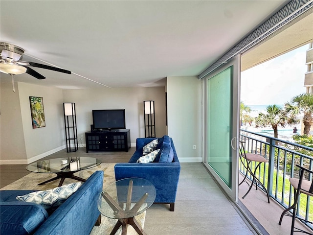 1390 Gulf Blvd Unit 104, Clearwater, FL 33767 - living room featuring plenty of natural light and ceiling fan