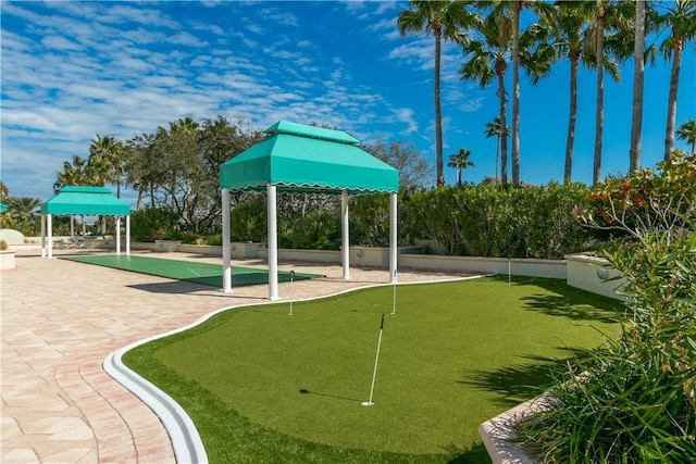 1390 Gulf Blvd Unit 104, Clearwater, FL 33767 - view of property's community with an area to practice putting and a gazebo