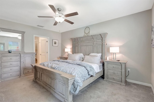 bedroom with light colored carpet, baseboards, a ceiling fan, and visible vents