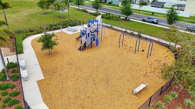 surrounding community featuring playground community and fence
