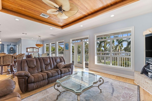 450 Bayshore Dr, Terra Ceia, FL 34250 - living room with recessed lighting, wooden ceiling, a raised ceiling, visible vents, and wood finished floors