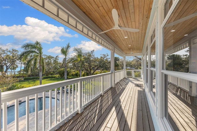 450 Bayshore Dr, Terra Ceia, FL 34250 - wooden deck with a water view and ceiling fan