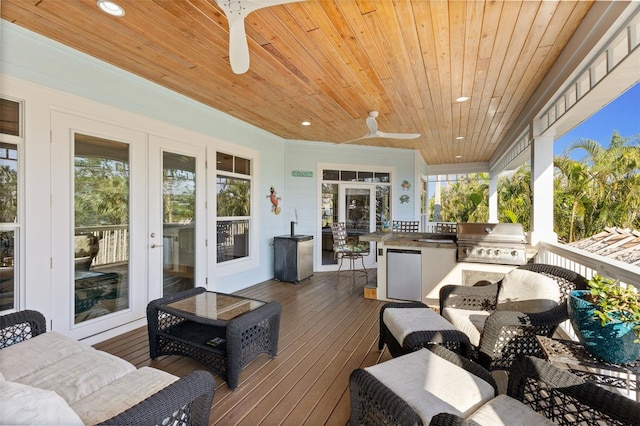 450 Bayshore Dr, Terra Ceia, FL 34250 - wooden terrace featuring a grill, area for grilling, and a ceiling fan