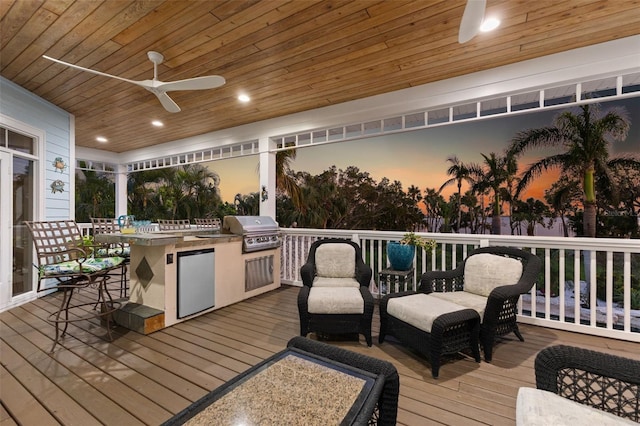 450 Bayshore Dr, Terra Ceia, FL 34250 - wooden deck featuring a grill, exterior kitchen, and ceiling fan