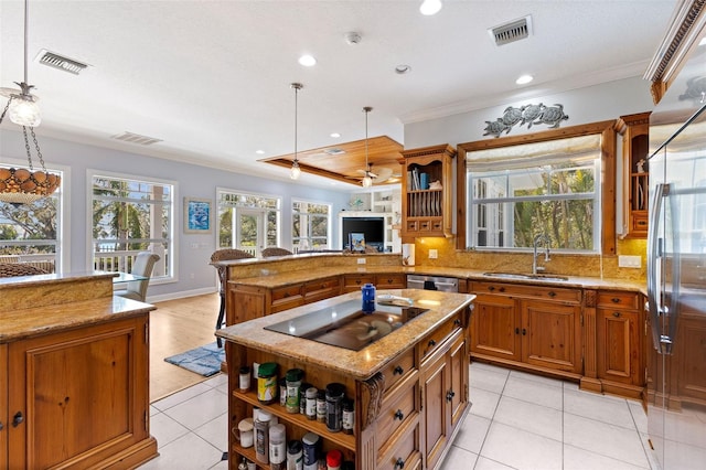 450 Bayshore Dr, Terra Ceia, FL 34250 - kitchen with visible vents, a sink, open shelves, and brown cabinets