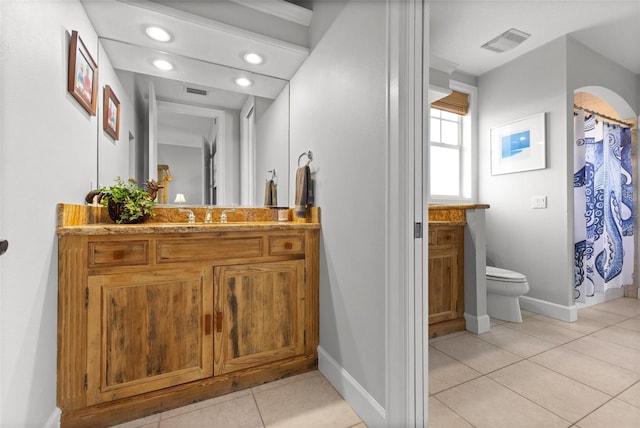 450 Bayshore Dr, Terra Ceia, FL 34250 - full bath featuring visible vents, baseboards, toilet, tile patterned floors, and vanity