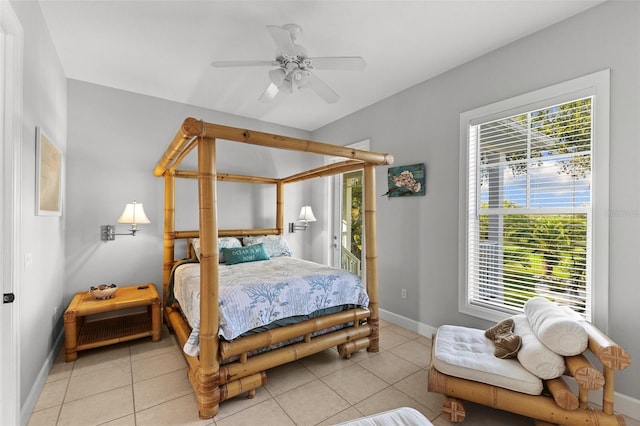 450 Bayshore Dr, Terra Ceia, FL 34250 - bedroom featuring baseboards, ceiling fan, multiple windows, and light tile patterned floors