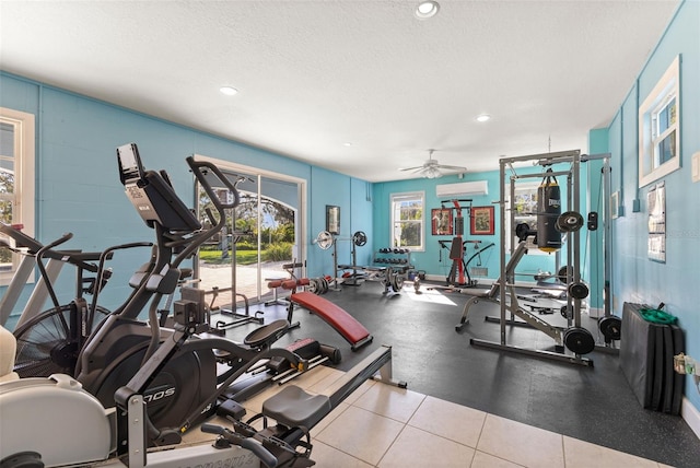 450 Bayshore Dr, Terra Ceia, FL 34250 - workout area with a wall unit AC, ceiling fan, recessed lighting, and a textured ceiling