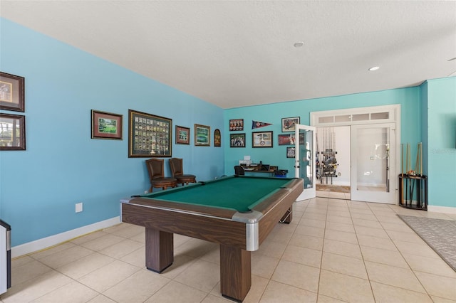450 Bayshore Dr, Terra Ceia, FL 34250 - game room with light tile patterned flooring, baseboards, pool table, and french doors
