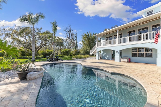450 Bayshore Dr, Terra Ceia, FL 34250 - pool with stairs and a patio area