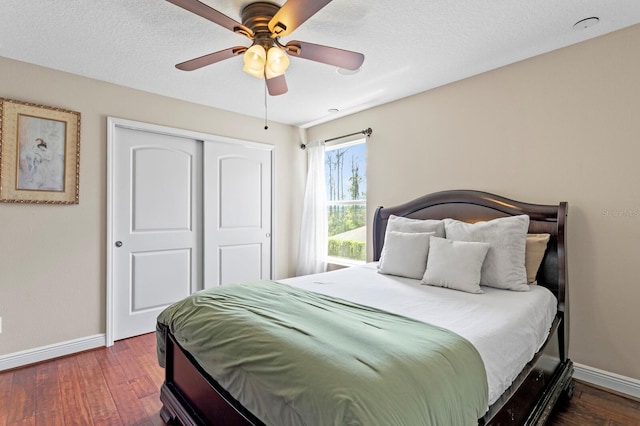 bedroom with baseboards, a closet, and wood-type flooring