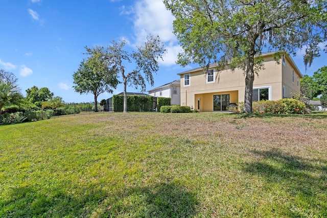view of yard with fence