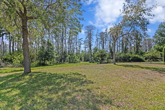 view of yard featuring fence
