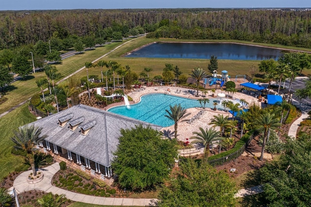 bird's eye view with a water view and a forest view