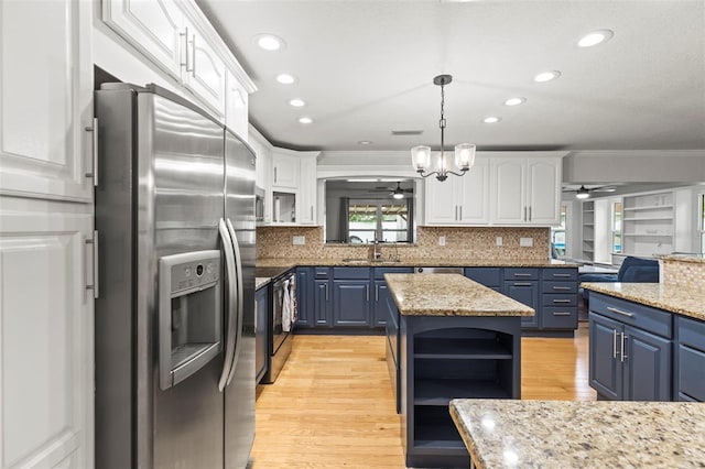 kitchen featuring stainless steel fridge with ice dispenser, white cabinets, and blue cabinets