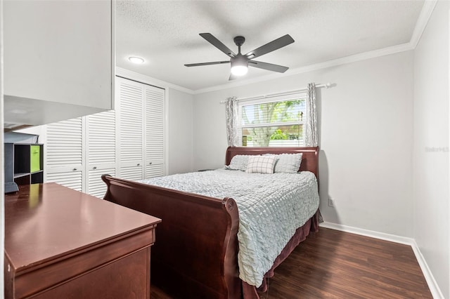 bedroom featuring dark wood-type flooring, crown molding, baseboards, and a textured ceiling