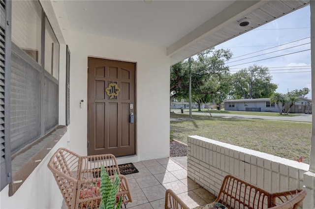 doorway to property with stucco siding