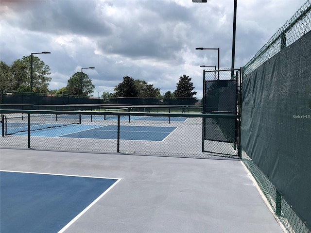 301 Caloosa Palms Ct, Sun City Center, FL 33573 - view of tennis court