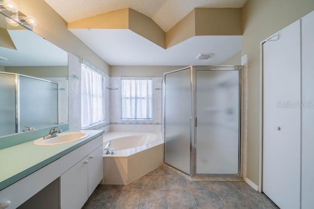 301 Caloosa Palms Ct, Sun City Center, FL 33573 - bathroom featuring vanity, a stall shower, and a bath