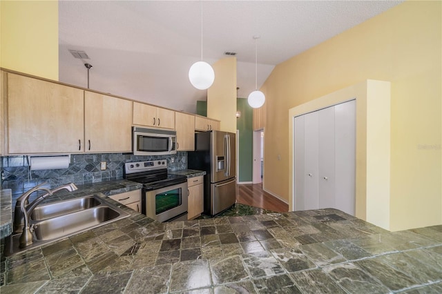 301 Caloosa Palms Ct, Sun City Center, FL 33573 - kitchen featuring stainless steel appliances, light brown cabinetry, backsplash, tile countertops, and hanging light fixtures