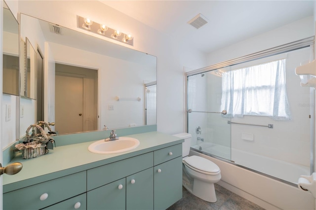 301 Caloosa Palms Ct, Sun City Center, FL 33573 - full bathroom featuring vanity and enclosed tub / shower combo