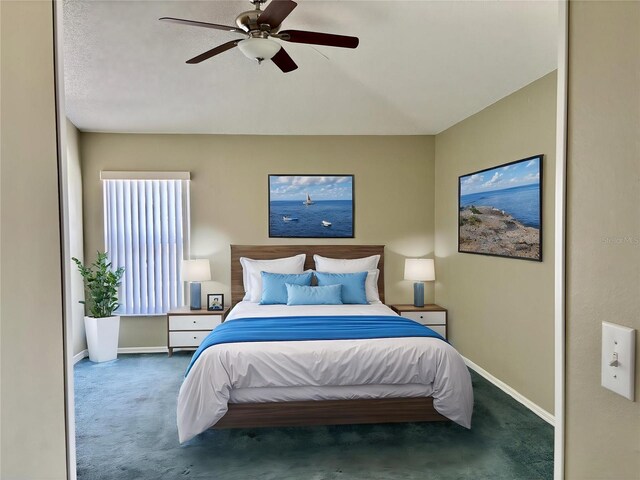 301 Caloosa Palms Ct, Sun City Center, FL 33573 - carpeted bedroom featuring baseboards and a ceiling fan