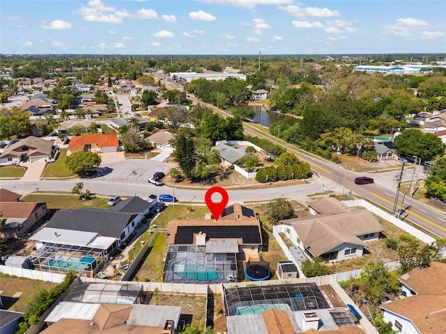 birds eye view of property with a residential view