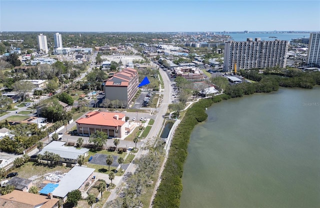 aerial view featuring a water view and a view of city