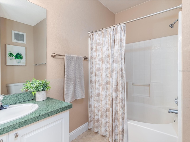 2709 Via Cipriani Unit 522B, Clearwater, FL 33764 - full bath featuring visible vents, shower / tub combo, baseboards, vanity, and tile patterned flooring
