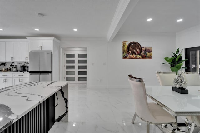 dining space featuring marble finish floor, ornamental molding, baseboards, and recessed lighting