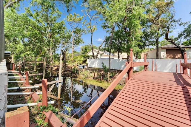 view of dock with fence
