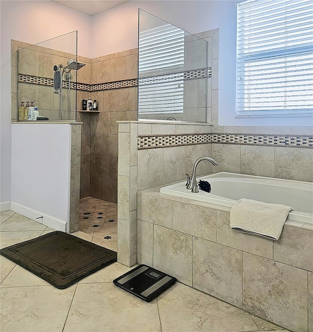full bathroom with a bath, tile patterned floors, and walk in shower