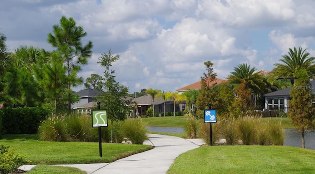 view of community featuring a lawn