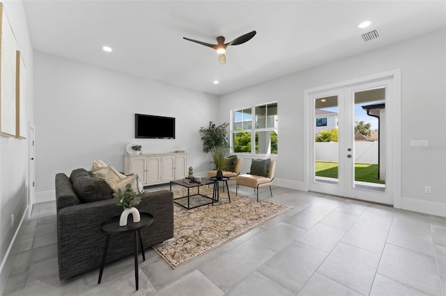 806 W Adalee St, Tampa, FL 33603 - living room featuring a ceiling fan, french doors, baseboards, recessed lighting, and light tile patterned floors
