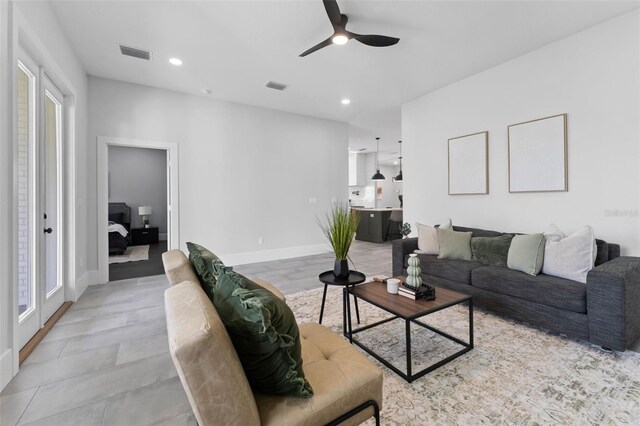 806 W Adalee St, Tampa, FL 33603 - living area with a ceiling fan, baseboards, and recessed lighting