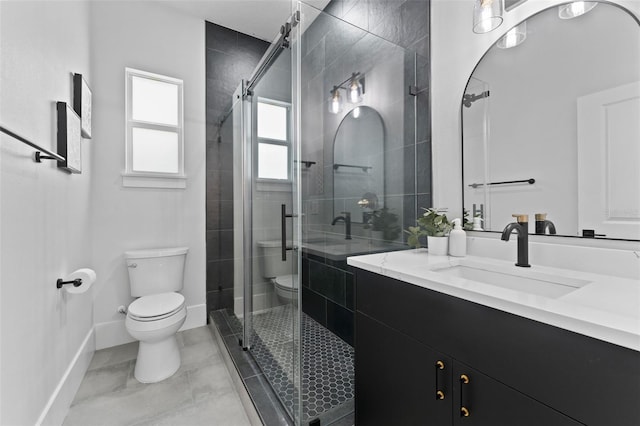 806 W Adalee St, Tampa, FL 33603 - bathroom with toilet, a stall shower, baseboards, and vanity
