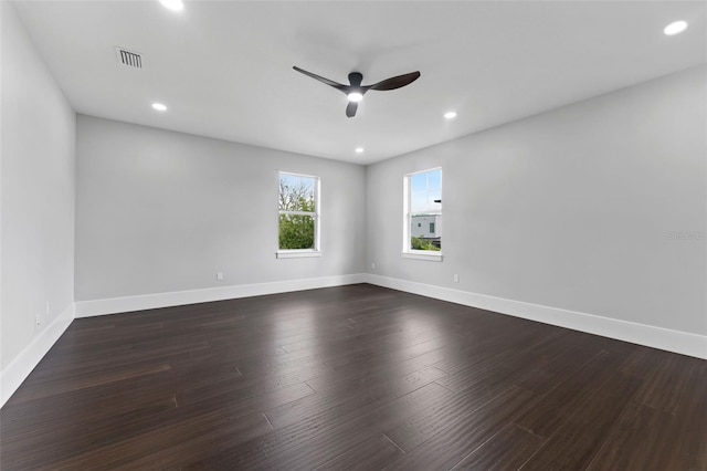 806 W Adalee St, Tampa, FL 33603 - unfurnished room with ceiling fan, baseboards, recessed lighting, and dark wood finished floors