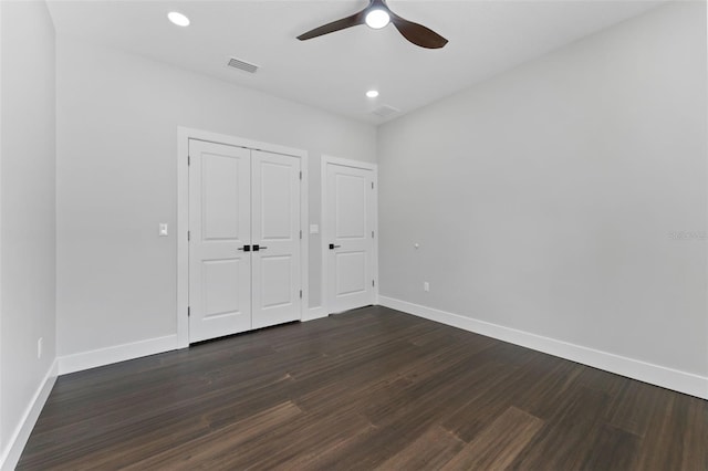 806 W Adalee St, Tampa, FL 33603 - unfurnished bedroom featuring baseboards, dark wood-type flooring, recessed lighting, a closet, and a ceiling fan
