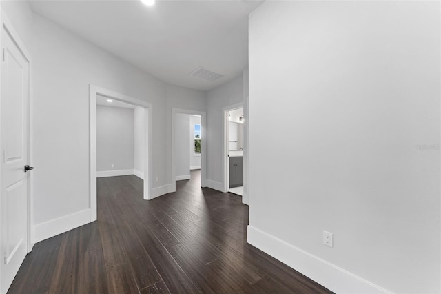806 W Adalee St, Tampa, FL 33603 - hall with baseboards and dark wood-style floors