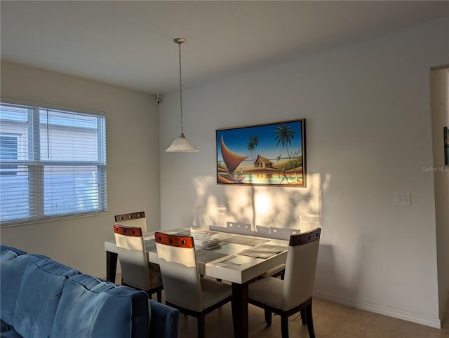 11527 Southern Creek Dr, Gibsonton, FL 33534 - dining room with baseboards and light tile patterned flooring