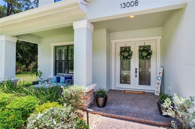 13008 Eagles Entry Dr, Odessa, FL 33556 - entrance to property featuring french doors and stucco siding