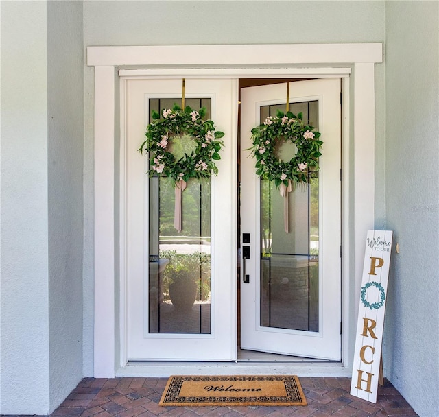 13008 Eagles Entry Dr, Odessa, FL 33556 - view of exterior entry featuring stucco siding
