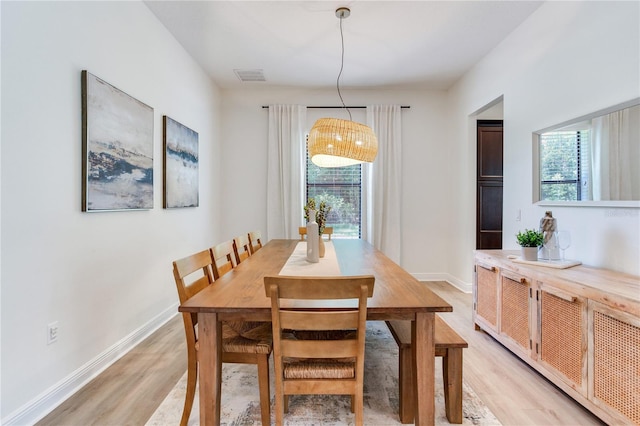 13008 Eagles Entry Dr, Odessa, FL 33556 - dining space featuring light wood finished floors and baseboards