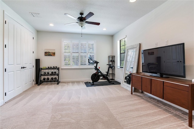 13008 Eagles Entry Dr, Odessa, FL 33556 - workout room featuring a ceiling fan, light colored carpet, baseboards, and recessed lighting