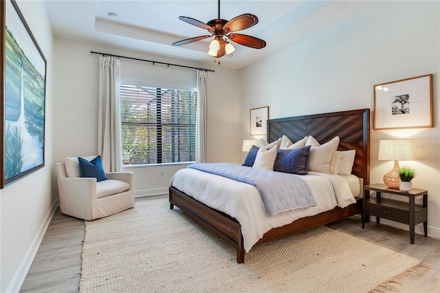 13008 Eagles Entry Dr, Odessa, FL 33556 - bedroom featuring wood finished floors, baseboards, and ceiling fan