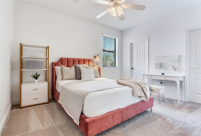 13008 Eagles Entry Dr, Odessa, FL 33556 - bedroom with light colored carpet, baseboards, and ceiling fan