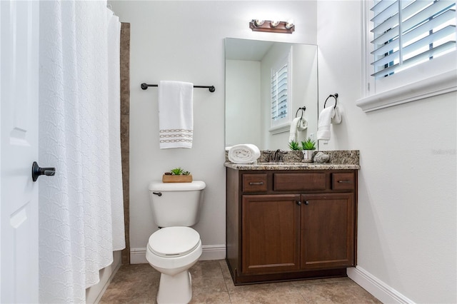 13008 Eagles Entry Dr, Odessa, FL 33556 - bathroom featuring vanity, baseboards, toilet, and tile patterned floors