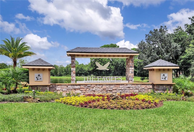 13008 Eagles Entry Dr, Odessa, FL 33556 - community sign with a lawn